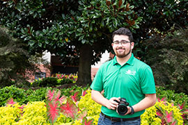 student with camera