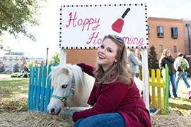 student with pony