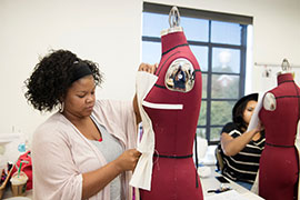 student working with mannequin